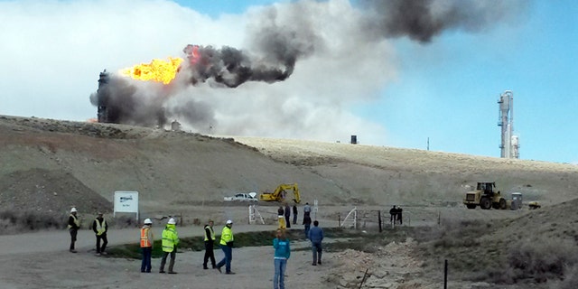 April 23: This image shows officials at the site of an explosion and fire at a natural gas processing facility and major national pipeline hub in Opal, Wyo.