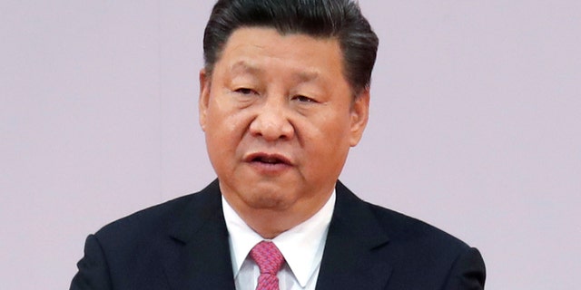 FILE - In this Saturday, July 1, 2017, file photo, Chinese President Xi Jinping speaks after administering the oath for the Hong Kong's new Chief Executive Carrie Lam at the Hong Kong Convention and Exhibition Center in Hong Kong. The White House said Sunday that President Donald Trump has spoken with the leaders of China and Japan and reaffirmed their shared commitments to dealing with North Korea. (AP Photo/Kin Cheung, File)