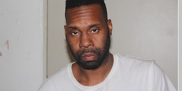 Corey Menafee is sorry for breaking the window, but believes it depicted a racist image.