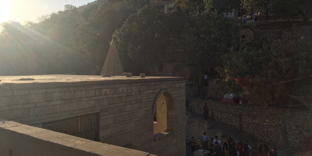 The Yazidis' holiest site, the Temple of Lalish, lies on the outskirts of Mosul, just miles from the terror army's stronghold.