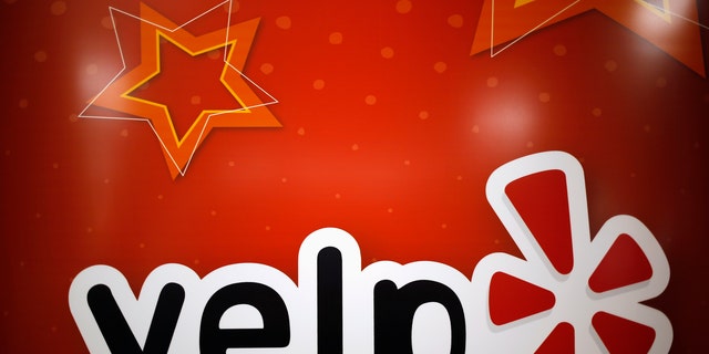 File photo - The Yelp Inc. logo is seen in their offices in Chicago, Illinois, March 5, 2015. (REUTERS/Jim Young)