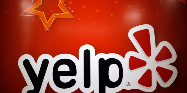 File photo - The Yelp Inc. logo is seen in their offices in Chicago, Illinois, March 5, 2015. (REUTERS/Jim Young)