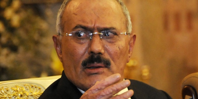 Dec. 24, 2011: Yemen's President Ali Abdullah Saleh speaks to reporters during a news conference at the Presidential Palace in Sanaa, Yemen.