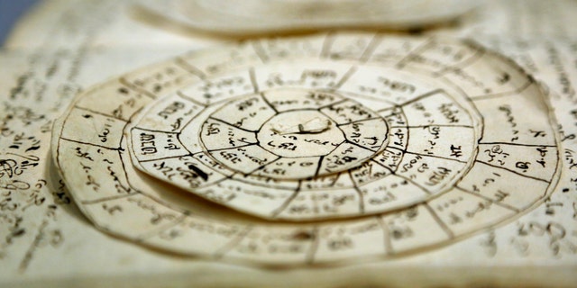 A manuscript that includes astronomical calculators is displayed at the YIVO Institute for Jewish Research in New York, Tuesday, Oct. 24, 2017. This document along with more than 170,000 other pages are part of a recently discovered trove of Jewish materials from Lithuania thought to have been destroyed during the Holocaust. (AP Photo/Seth Wenig)