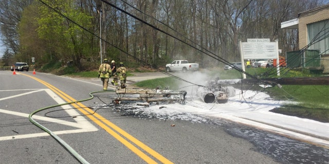 The driver of the car, believed to have suffered a heart attack, slammed into a utility pole before crashing into a CVS.