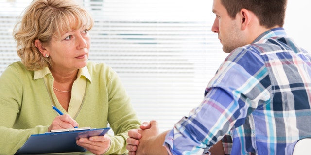 young adult in therapy mental health counseling istock large