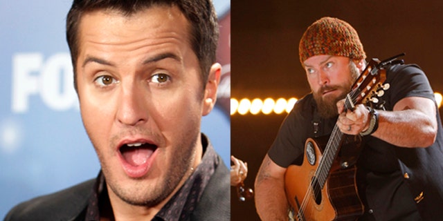 Zac Brown (R) and Jimmy De Martini of Zac Brown Band perform during the Country Music Association (CMA) Music Festival in Nashville, Tennessee June 7, 2012. REUTERS/Harrison McClary (UNITED STATES - Tags: ENTERTAINMENT) - RTR339VJ