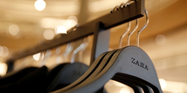 Clothes hangers are seen in a Zara store, an Inditex brand, in central Barcelona, Spain, December 13, 2016.