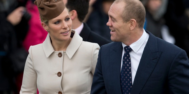 This is a Tuesday, Dec. 25, 2012 file photo of Britain's Queen Elizabeth II's granddaughter Zara Phillips and her husband rugby player Mike Tindall. Buckingham Palace said Phillips and Tindall are expecting their first child in the new year.