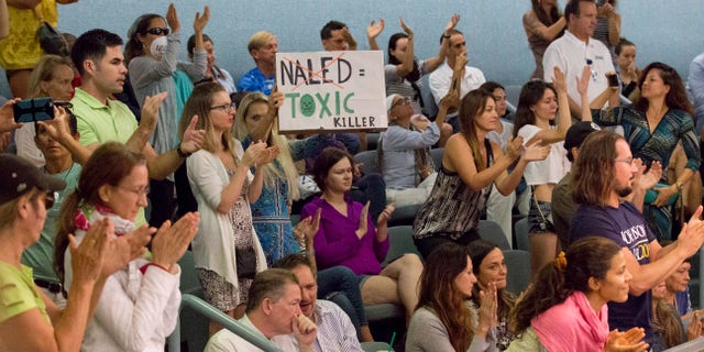 zika_miami_naled_protest_ap