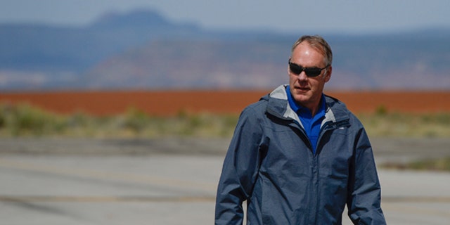 Interior Secretary Ryan Zinke arrives at the Blanding airport on Monday, May 8, 2017, for an aerial tour of the recently designated Bears Ears National Monument in southeastern Utah by President Barack Obama on Dec. 28, 2016. Utah Republicans in Congress are advocating for Trump to jettison Utah's national monument designation.  (Francisco Kjolseth/The Salt Lake Tribune via AP)