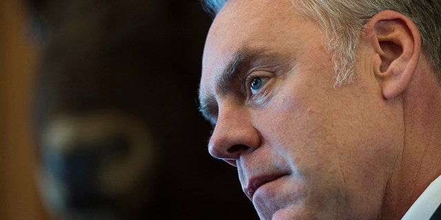 Interior Secretary Ryan Zinke speaks at the Interior Department in Washington, March 29, 2017.
