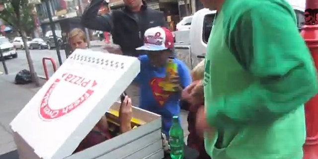 A team of pranksters scared the pepperoni out of people thinking they were getting a free slice of pizza.