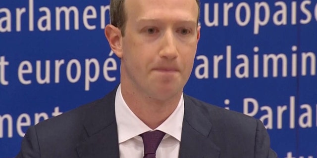 Facebook's CEO Mark Zuckerberg answers questions about the improper use of millions of users' data by a political consultancy, at the European Parliament in Brussels, Belgium.
