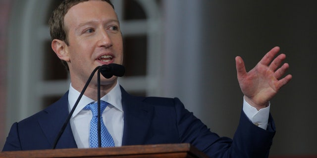 Facebook CEO Mark Zuckerberg, seen here at Harvard's commencement in May, has had to defend his company's response to Russian meddling in the U.S. 2016 presidential election.