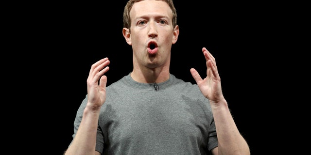 Mark Zuckerberg, founder of Facebook, speaks as he attends the unveiling ceremony of the new Samsung S7 and S7 edge smarthphones at the Mobile World Congress in Barcelona, Spain, Feb. 21, 2016. (REUTERS/Albert Gea)