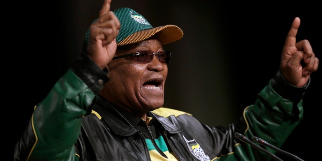 In this June 30, 2017 file photo South Africa's ruling African National Congress (ANC) party leader, President Jacob Zuma, gestures as he addresses party delegates, during the ANC policy conference in Johannesburg, South Africa.