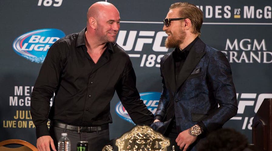 0519160-mcgregor-white-ufc.vresize.-08eedb4024cac510VgnVCM100000d7c1a8c0____.jpg