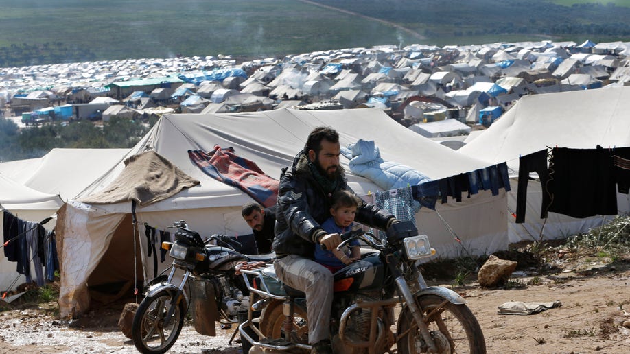 e620c824-Mideast Syria Displaced
