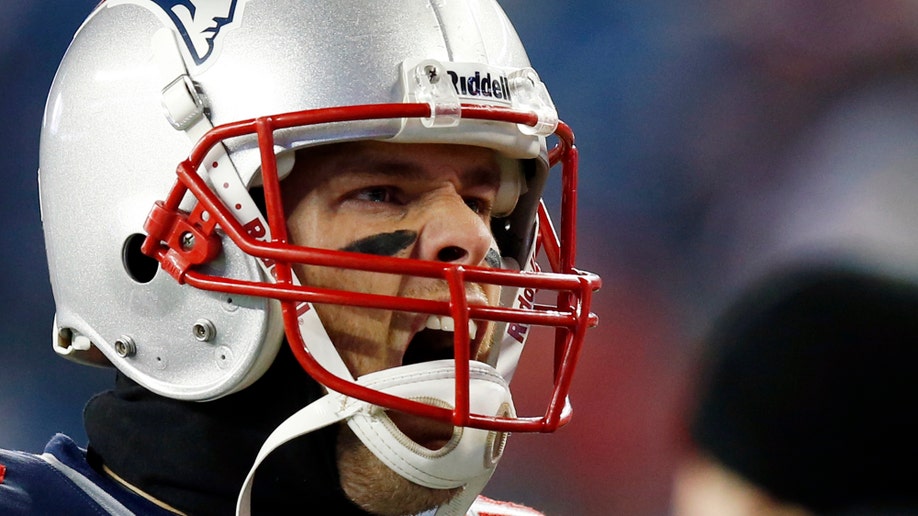 91c8b53a-Patriots Bradys Fire Football