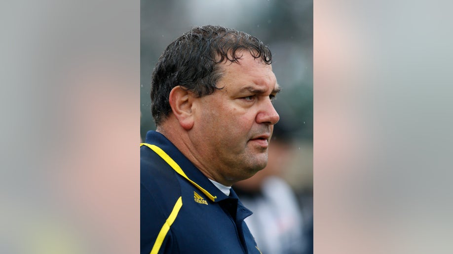 85e6c56b-Michigan Michigan St Football