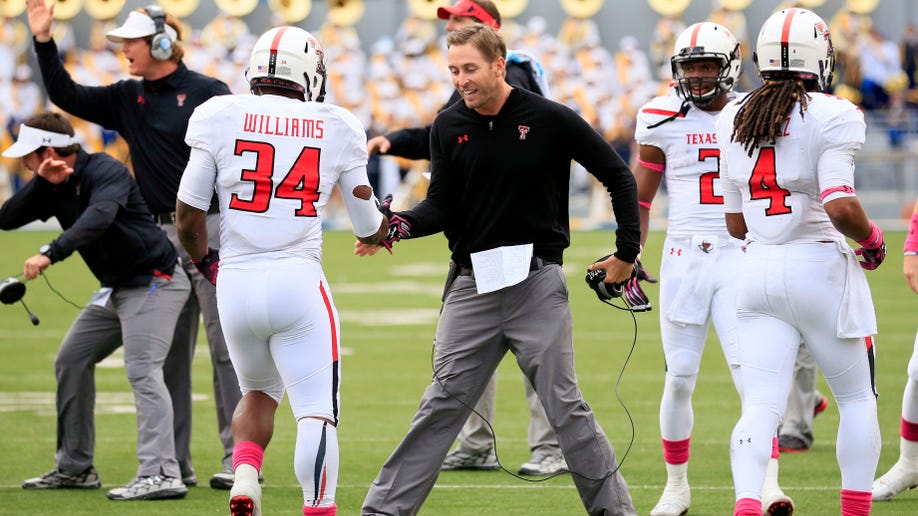 8e711a13-Texas Tech West Virginia Football