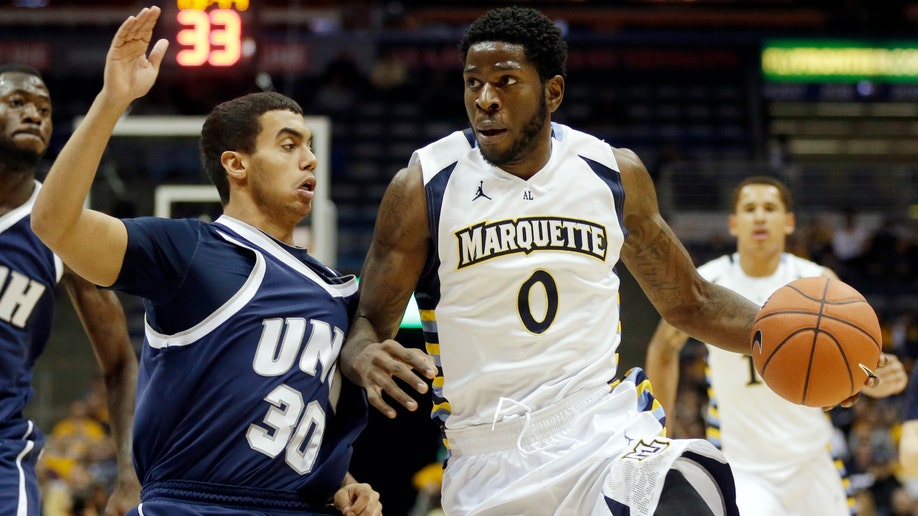 0cf5c3b5-New Hampshire Marquette Basketball