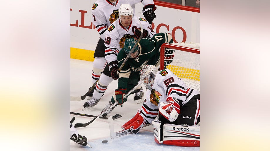 ee58a940-Blackhawks Wild Hockey