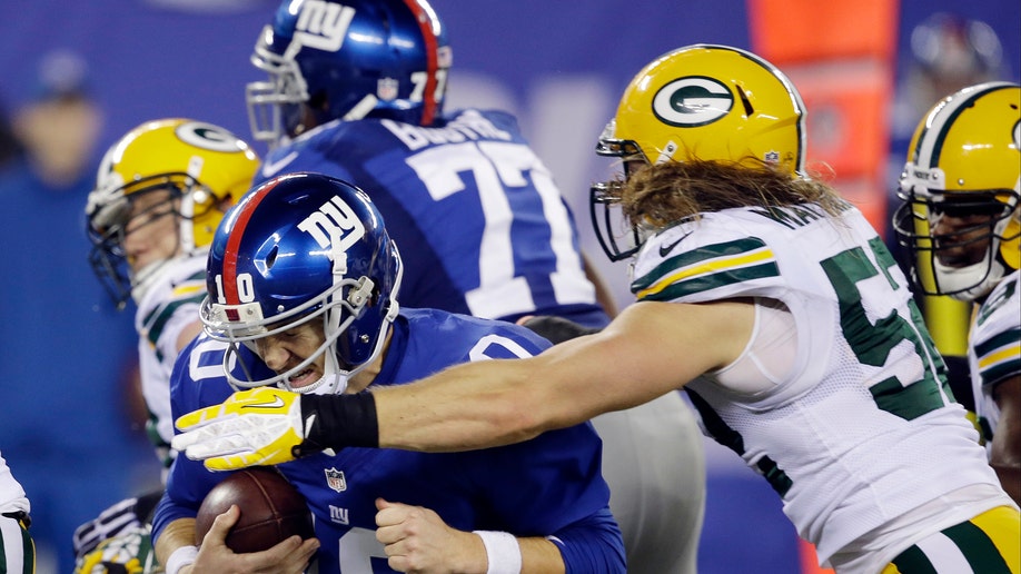a496a297-Packers Giants Football