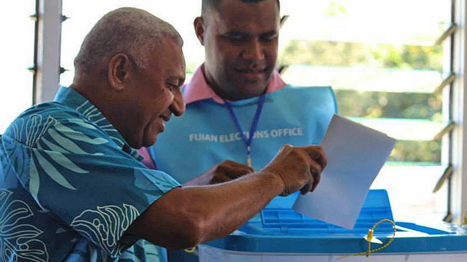 Fijians vote after 8 years of military rule, but questions remain about ...