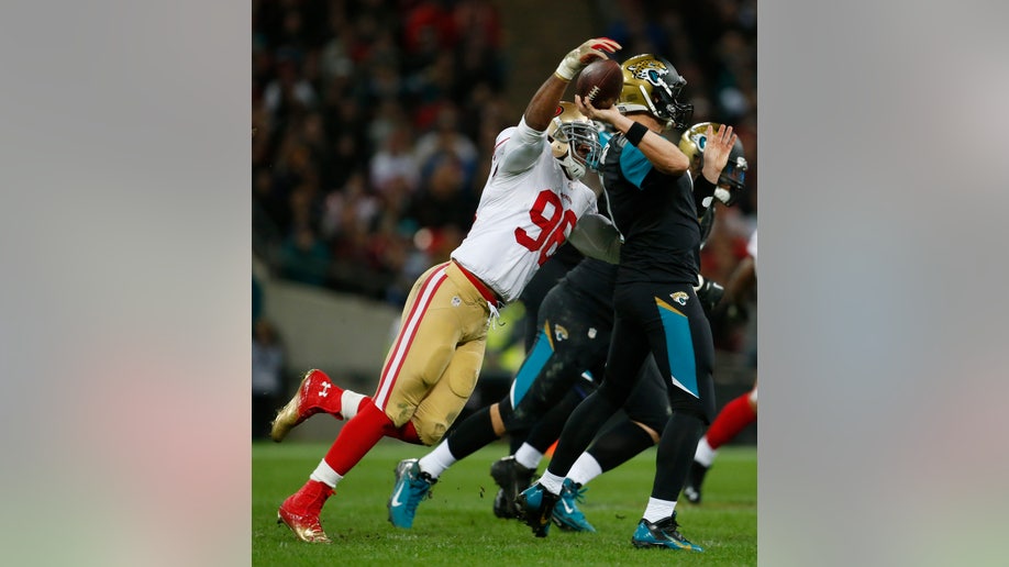 dadfb5c1-APTOPIX Britain 49ers Jaguars Football