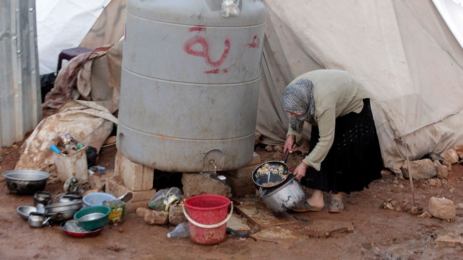 b896a3b8-Mideast Lebanon Syria