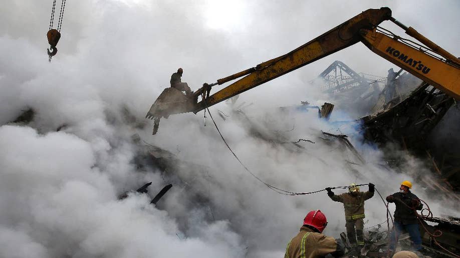 Rescue Teams Pull 2 Bodies From Iran Building Rubble | Fox News