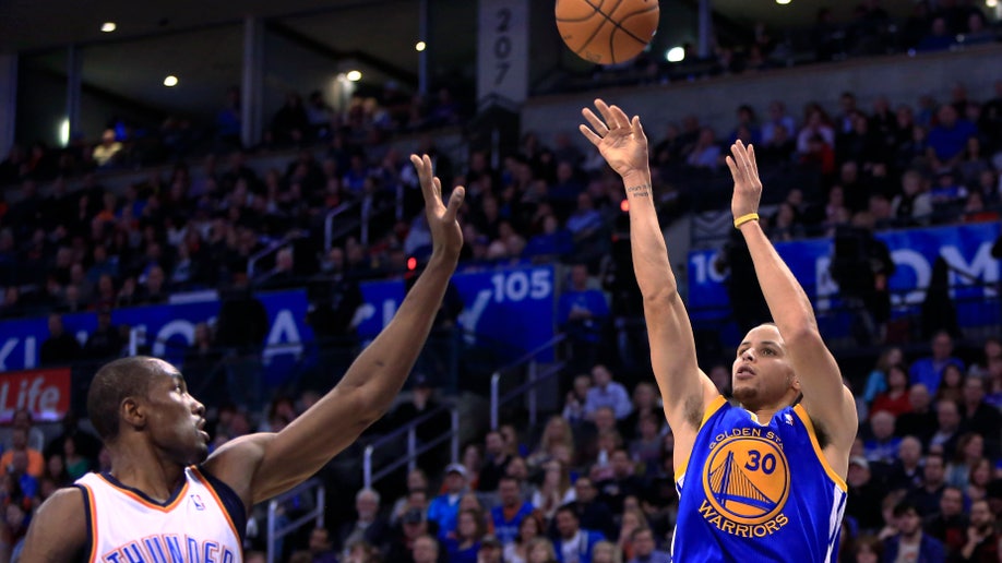 2a2b4e85-Warriors Thunder Basketball