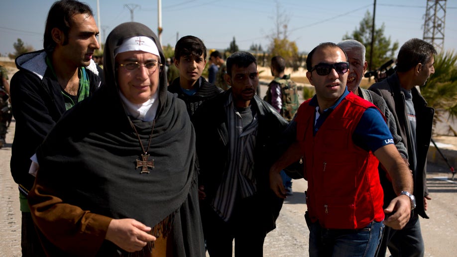 Mideast Syria Controversial Nun
