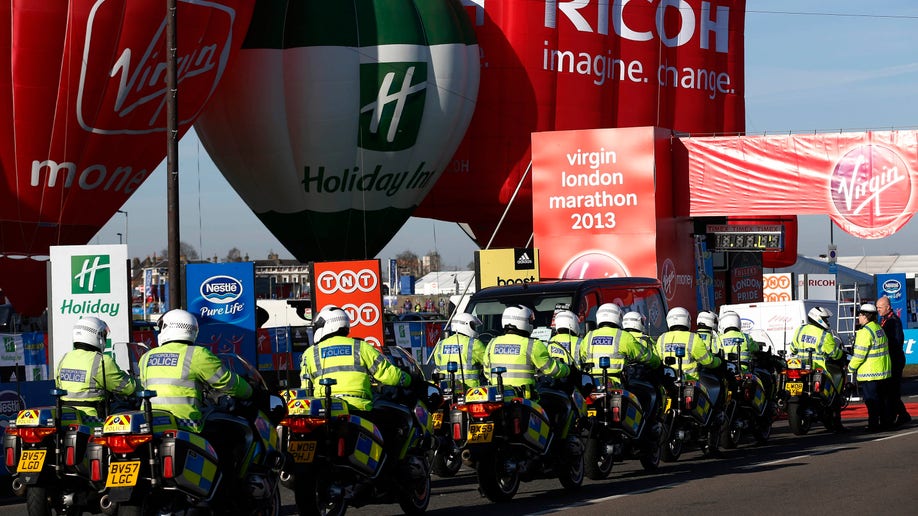 APTOPIX Britain Marathon Security