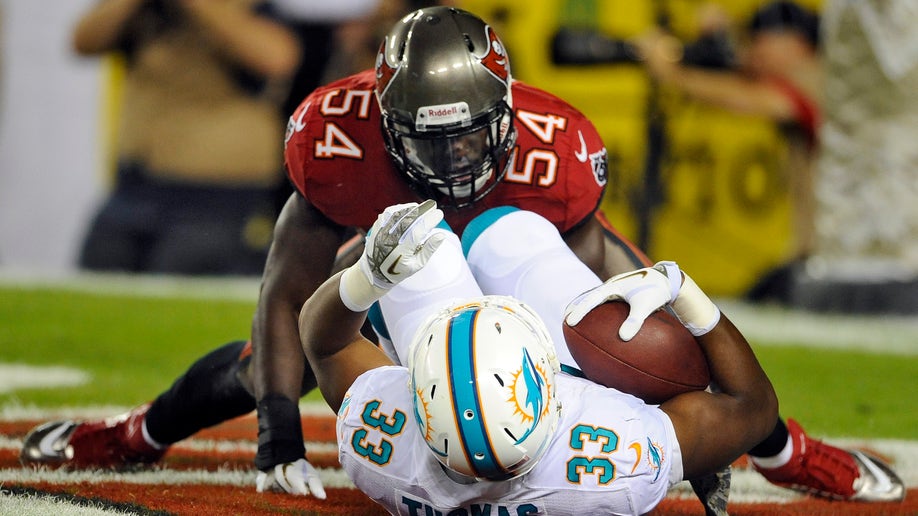 224b7922-Dolphins Buccaneers Football