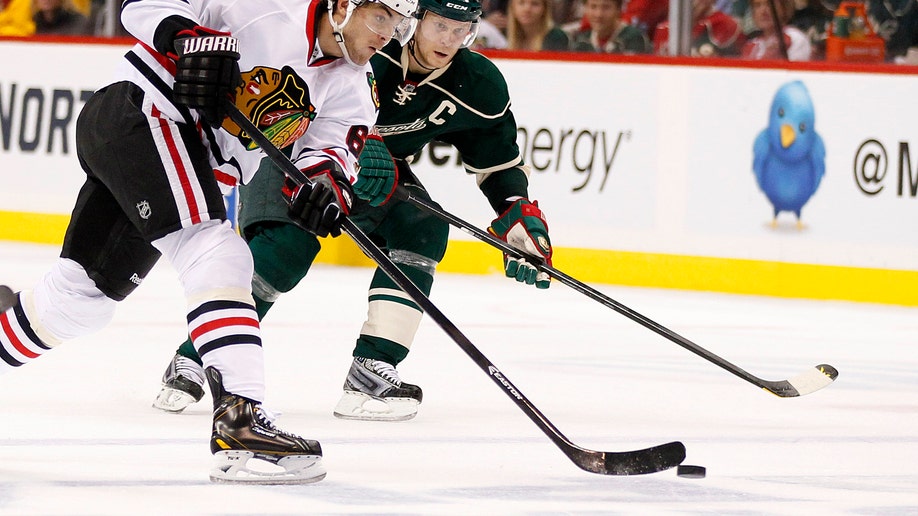 0d137f6e-Blackhawks Wild Hockey