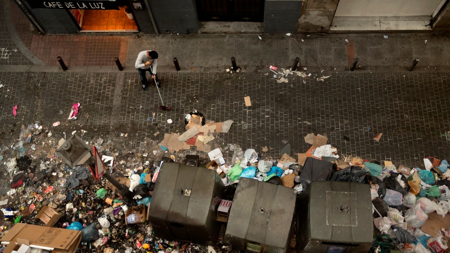 Trash collectors' strike that had filled Spain's capital with garbage ends after 13 days Fox News