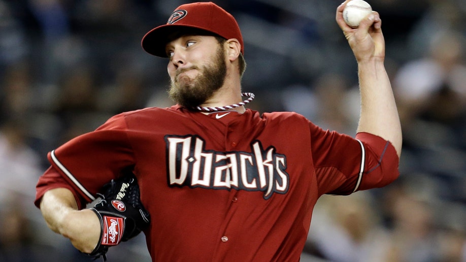 f69b23fb-Diamondbacks Yankees Baseball