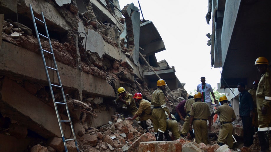 314dc2f9-India Building Collapse