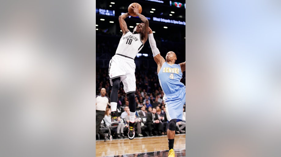 164365f1-Nuggets Nets Basketball