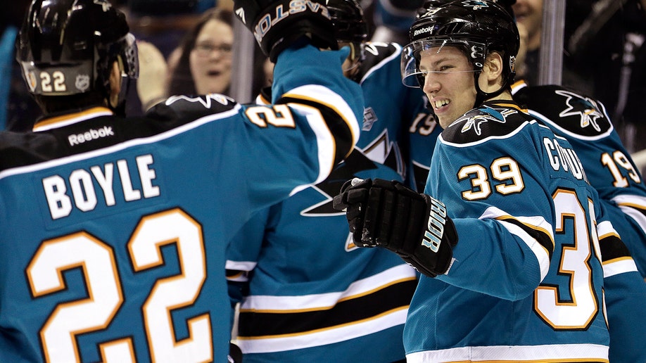 dd5b0699-CORRECTION Avalanche Sharks Hockey