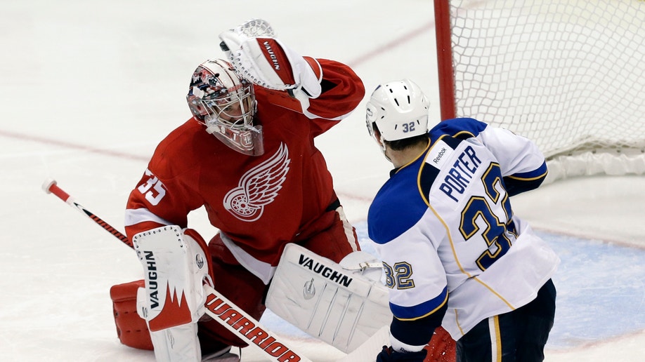 776c2f26-Blues Red Wings Hockey