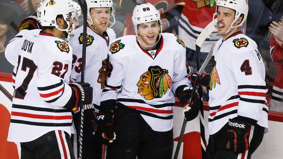 b304360f-Blackhawks Flames Hockey