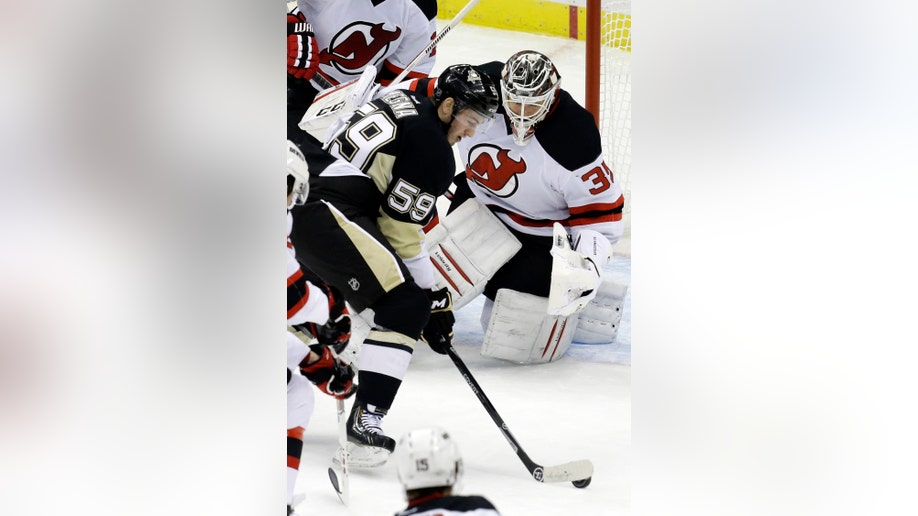 a3cd93fb-Devils Penguins Hockey