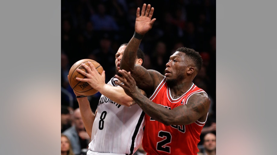 8b1081d2-Bulls Nets Basketball