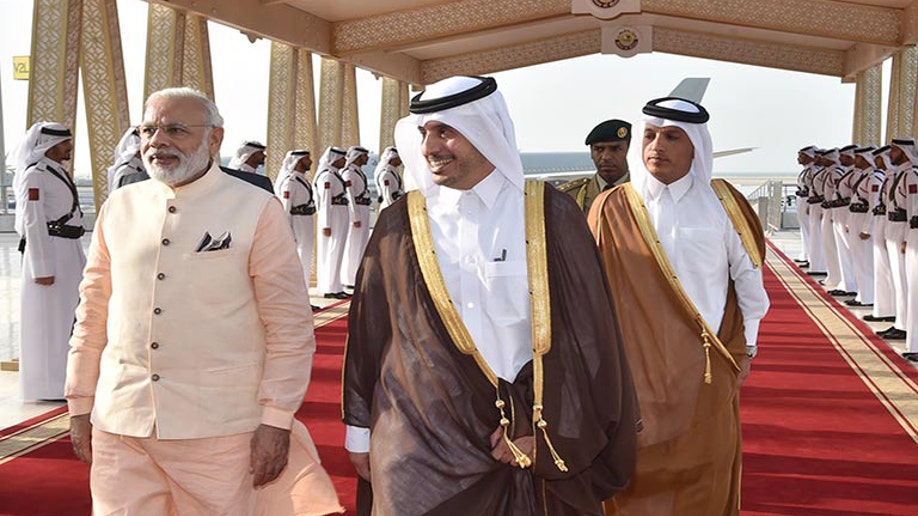 0db44bed-Mideast Qatar India