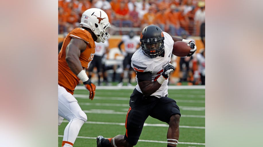 965f6dfa-Oklahoma St Texas Football