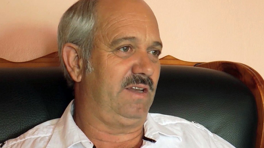 a90c6857-South Africa Mandela Jailer